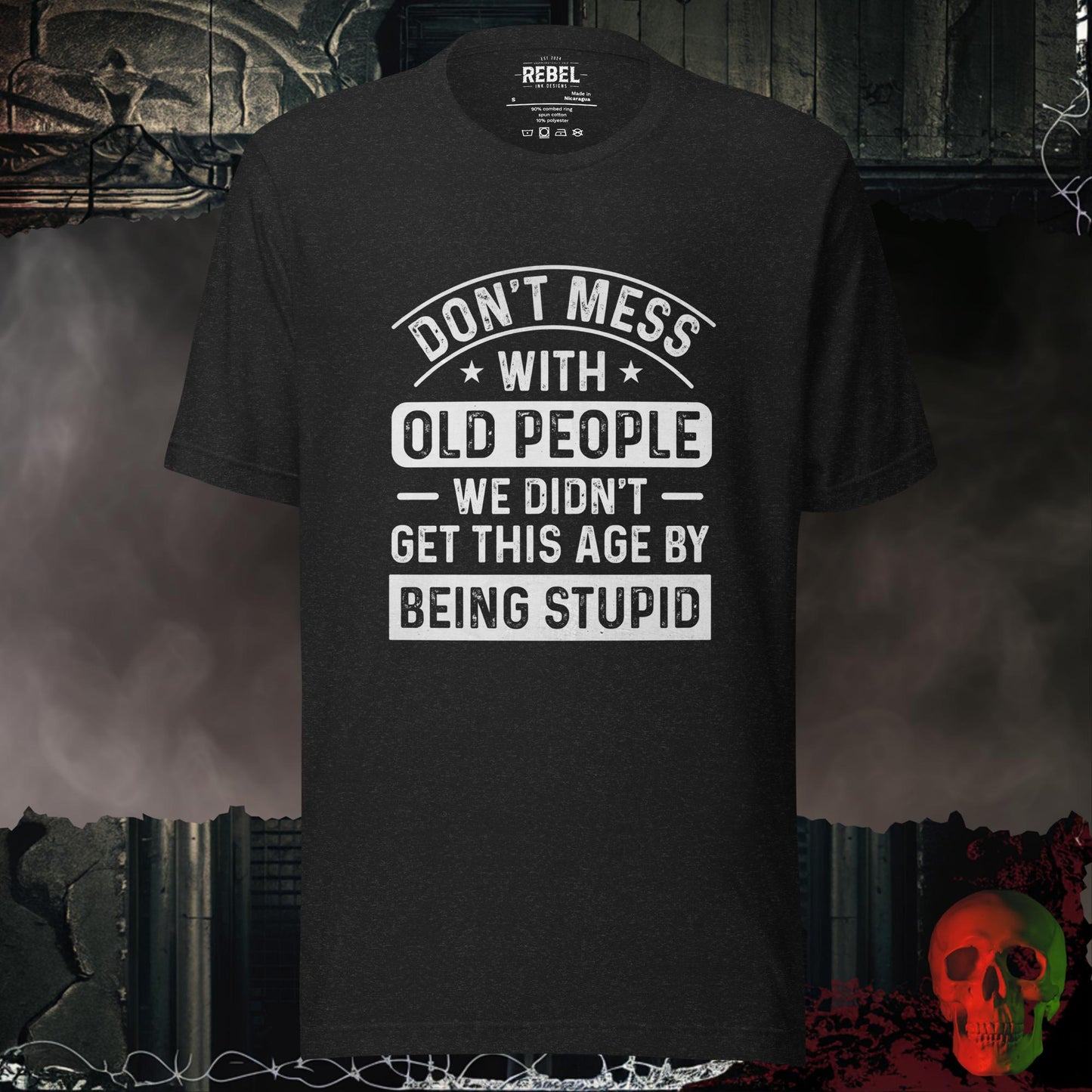 T-shirt featuring bold text that reads “Don’t Mess With Old People — We Didn’t Get This Age By Being Stupid.”