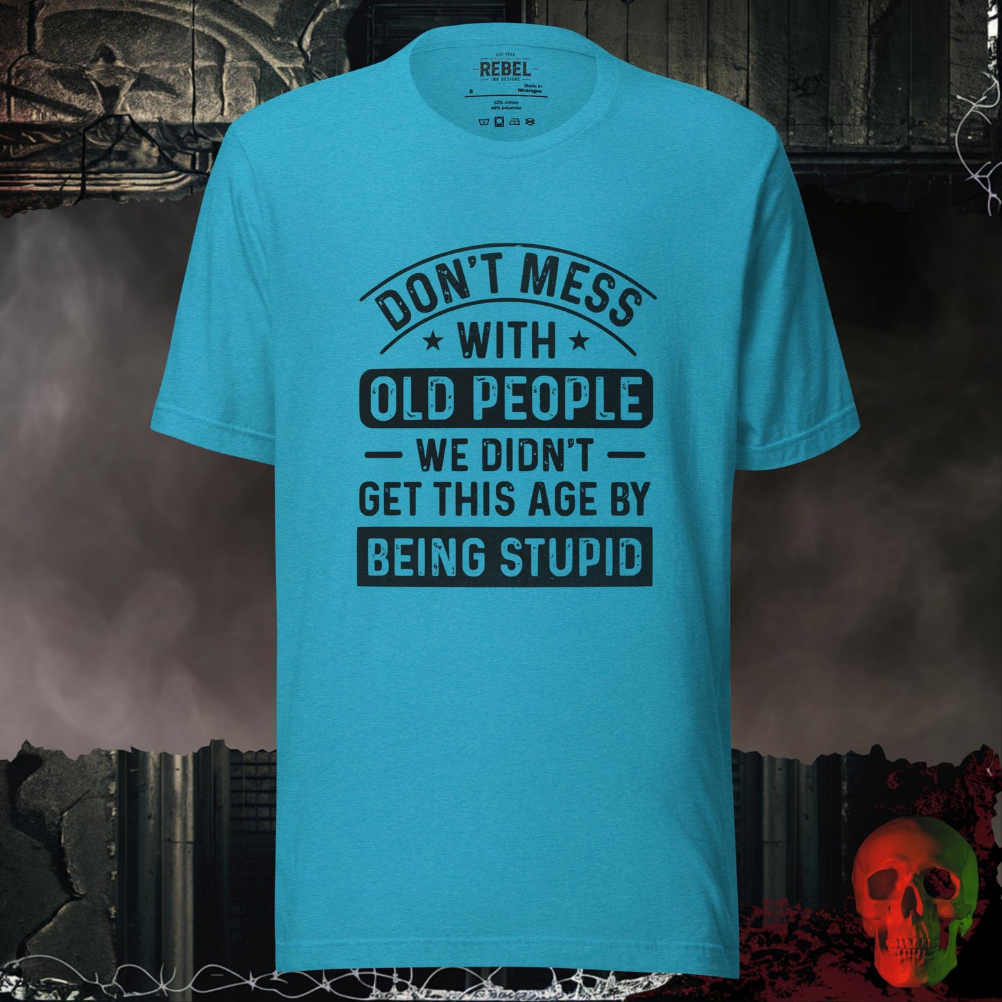 T-shirt featuring bold text that reads “Don’t Mess With Old People — We Didn’t Get This Age By Being Stupid.”