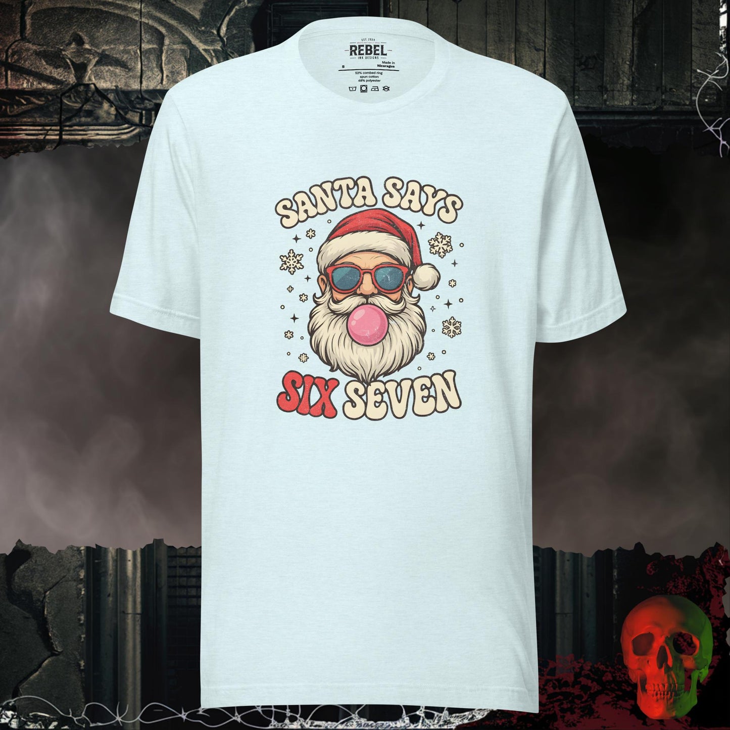 Santa Says Six Seven t-shirt featuring a retro Santa with sunglasses and bubble gum surrounded by snowflakes.