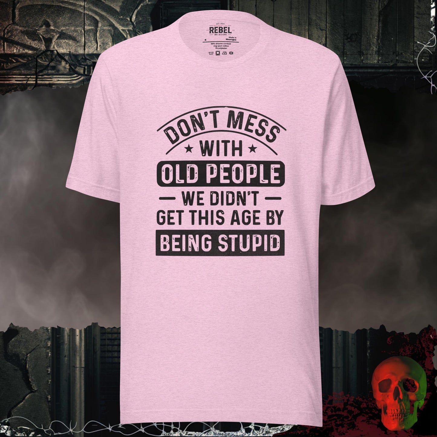 T-shirt featuring bold text that reads “Don’t Mess With Old People — We Didn’t Get This Age By Being Stupid.”